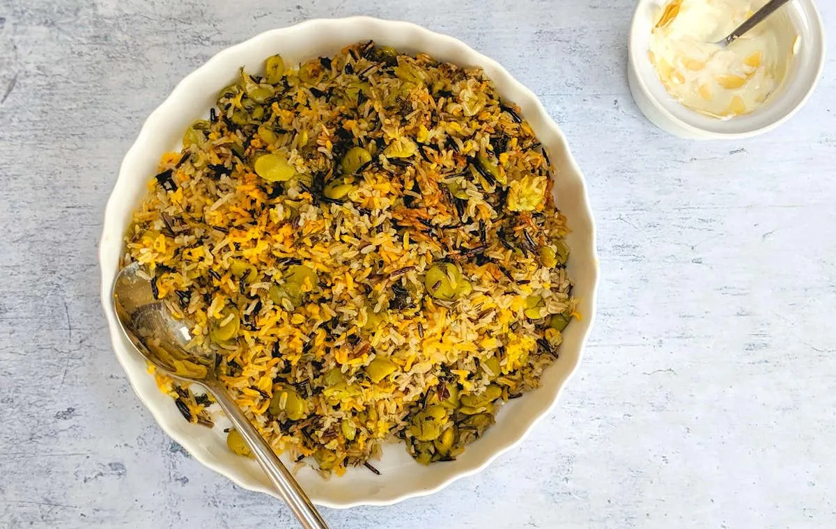 طرز تهیه باقالی پلو با مرغ ریش ریش؛ غذای سنتی خوش‌عطر